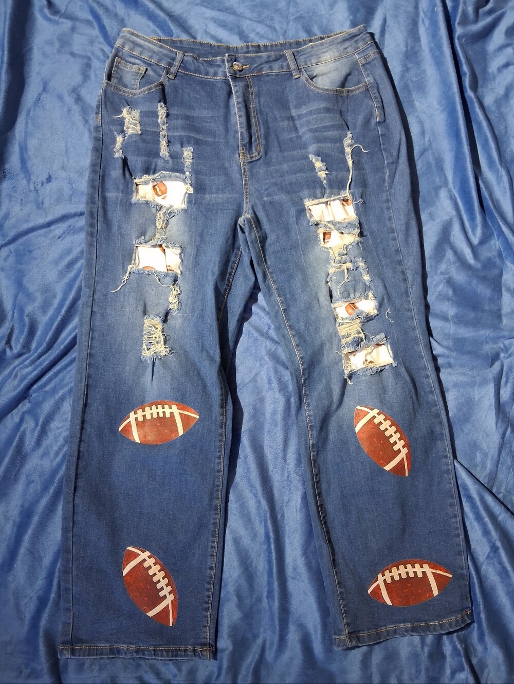 NWOT-Women's Distressed Blue Jeans with Football Patch Detail